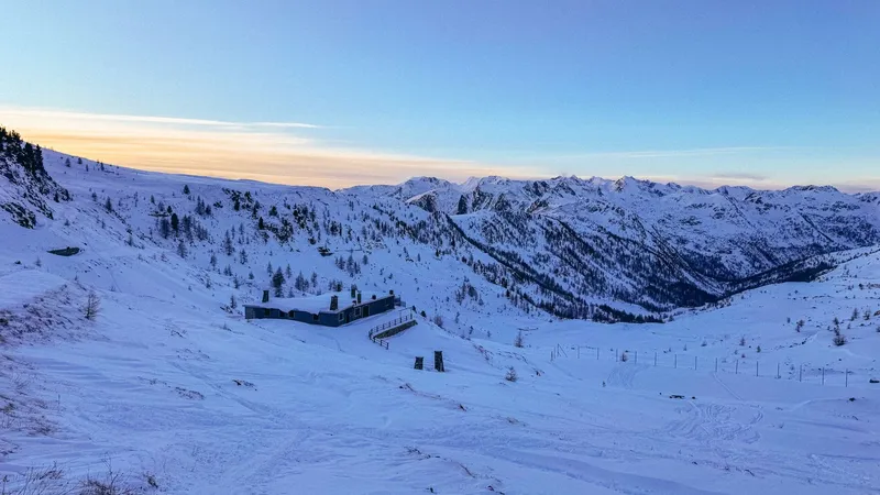 Sunrise over the snowy slopes of Isola 2000